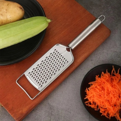Picture of Stainless Steel Paddle Grater Compact Cheese Grater Lemon Zester Food Shredder Hand Held Kitchen Utensil

 Vegetables peeler slicer Compact And Handy Tool For Grating Vegetables - Silver