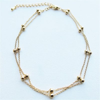 Picture of Stylish Multilayer Golden Colored Anklet for Women | Simple Design Foot Chain - Gold