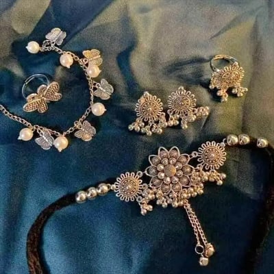 Picture of Gorgeous party wear antique silver necklace and earring set for girls and woman. - Silver