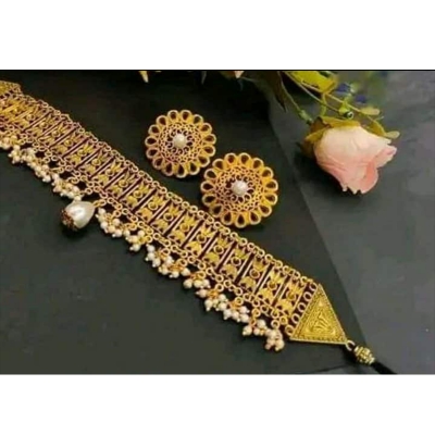 Picture of Gorgeous party wear antique golden necklace and earring set for girls and woman. - Gold