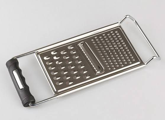 Picture of Fruit planer and Slicer / Stainless Steel with plastic grip Hand Greater Multifunctional Vegetables & Fruits Slicer - Silver