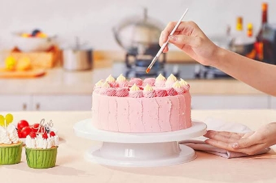 Picture of Ultimate 11-Inch Rotating Cake Turntable: High-Quality Revolving Stand for Effortless Cake Decorating and Baking Creations - White