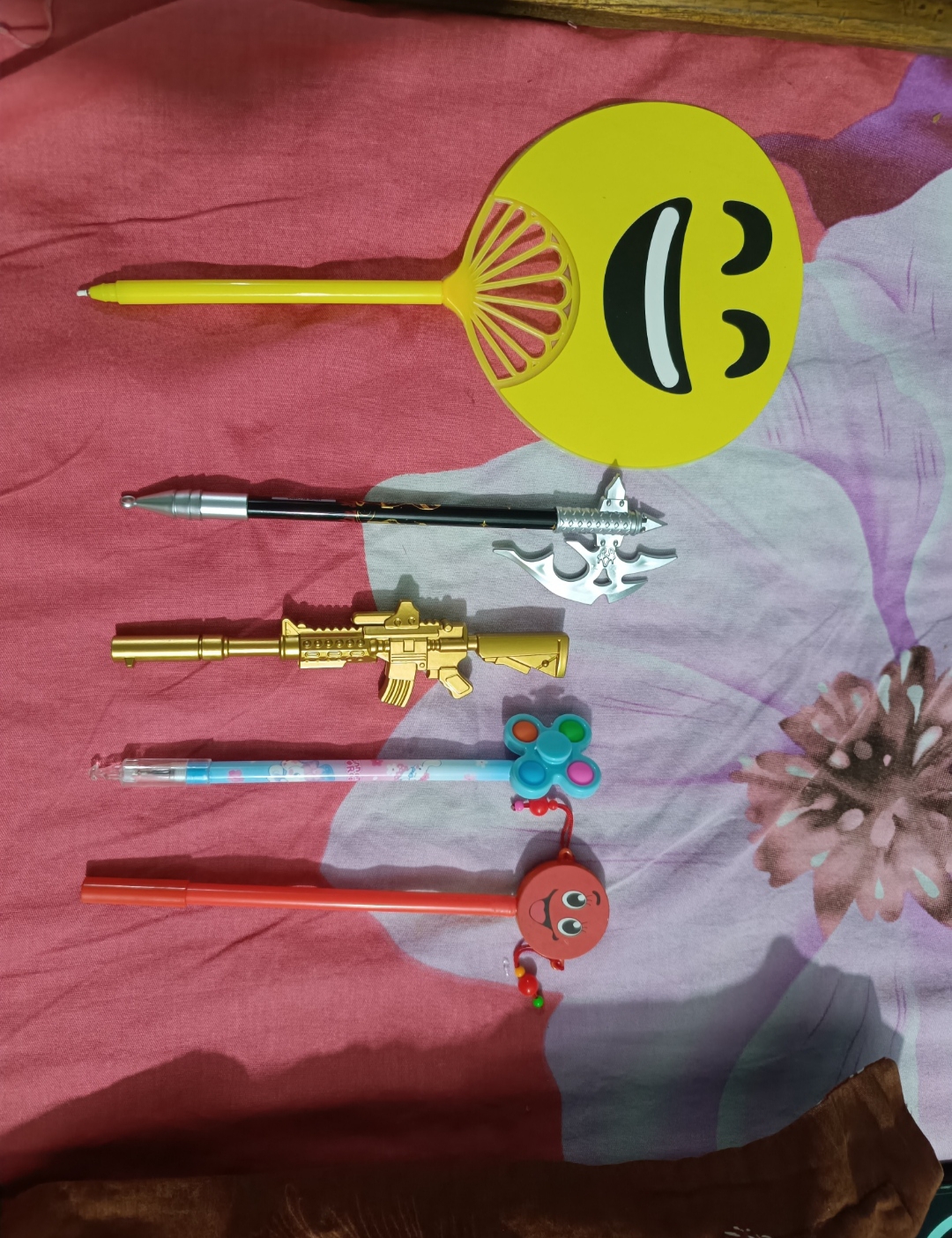 Picture of Emoji fan pen/Sword pen/Gun pen/cartoon, multi-model Shape Pen- 5 Pcs Beautiful design pen combo - Multicolor