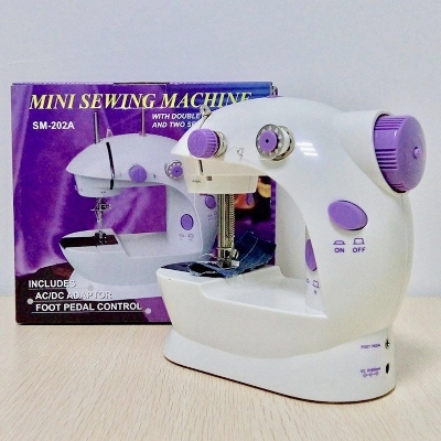 Picture of Top-Tier Option - Mini sewing machine-dual speed portable mini electrical paddle - Highly Durable - Effortless Usage White