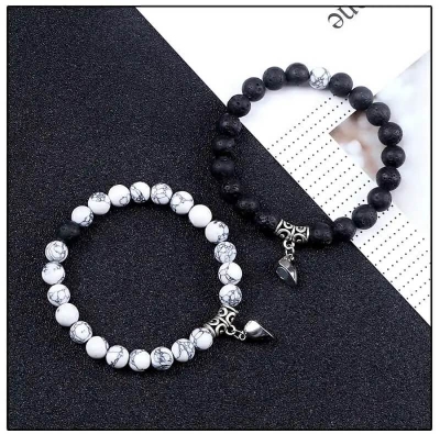 Picture of Magnetic Heart Bracelets for Couples (2 Piece) | Small Rubber Band Magnet Stone Bell Bracelet with Knotted Head Rope