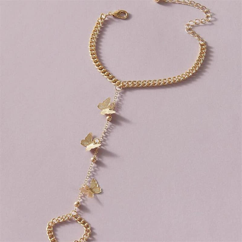 Picture of Exclusive Golden Stylish Bracelet Fashion Hand Finger Ring Types Bracelet Women