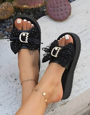 Picture of Women's Stylish Summer Slide Sandals - Black Open-Toe Flats with Golden Metal Buckle & Ruffled Decor, Soft Sole EVA Insole, Perfect for Casual Outfits, Versatile Sandals | Bow Embellished Footwear | Metal Buckle Detail, Strappy Sandals