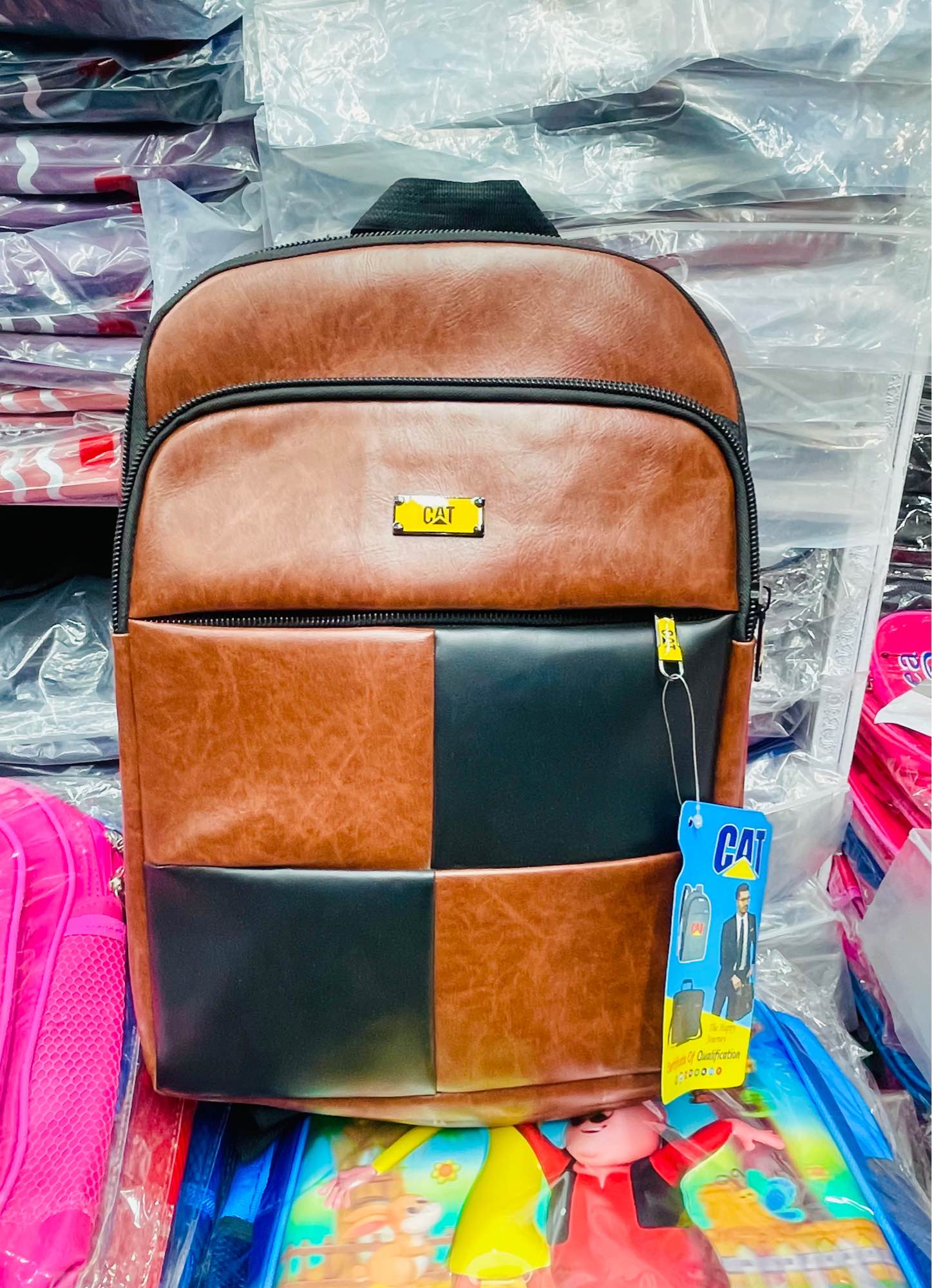 Picture of Viral CAT Design Faux Leather Laptop Backpack for Men & Women | Stylish Tan & Black Checkered College, Office & Travel Bag | Durable PU Leather, Multi-pocket Organizer