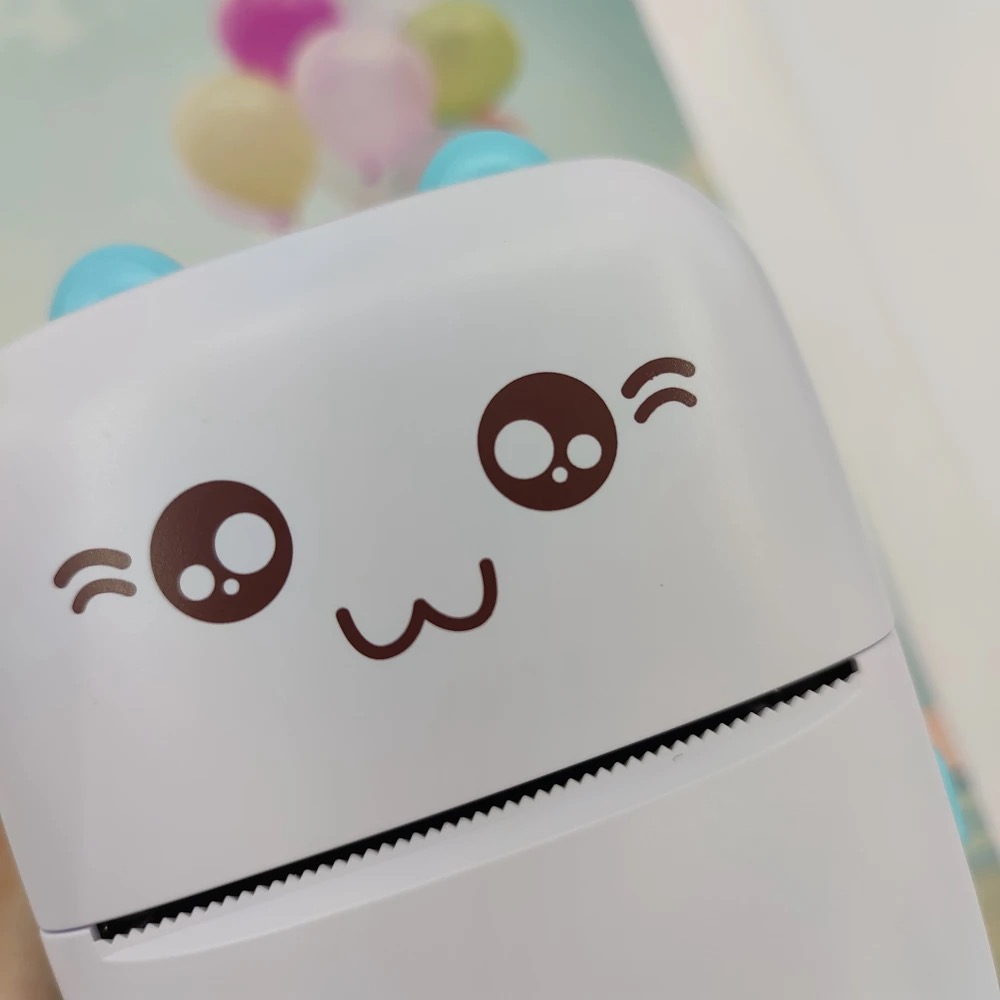 Picture of Portable Mini Printer | Compatible with iOS & Android | Wireless Bluetooth Thermal Printing | Great for Printing Text Messages, Labels, Photos, DIY Projects, Notes, and Creating Posters | Mini Pocket Printer | Ideal for Students, Teachers, and Creatives(Blue)