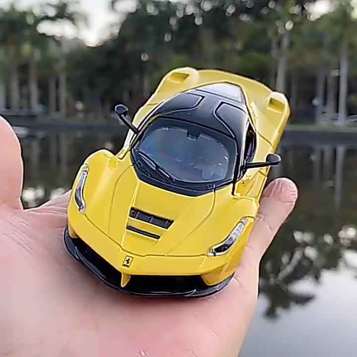 Picture of 1:32 Ferrari supercar, alloy die-casting car model, sound and light, door opening pull-back car toy, collection of birthday gifts - Multicolor