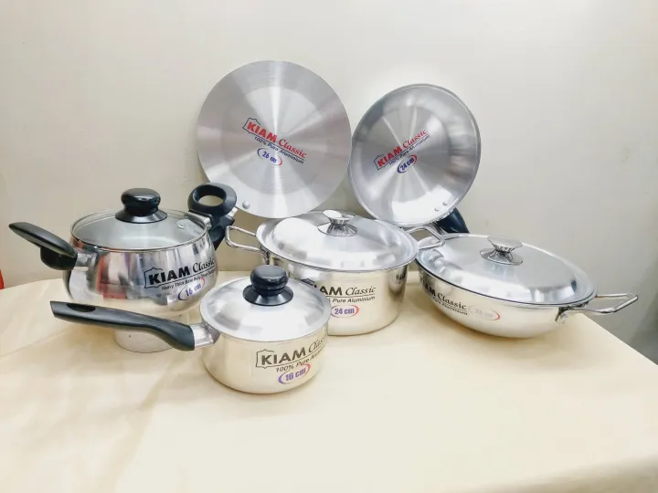 Picture of Exclusive 10 pcs Kiam Family Pack Cookware Set Aluminium. Casserole Stock Pot, Korai, Milk Pan, Baly Such Pan, Ruti Tawa, Fry Pan & - Silver