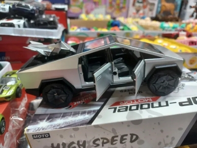 Picture of 1:28 Tesla Cybertruck Diecast Metal Alloy Model car Sound Light Pull Back Collection Kids Toy Gifts - Multicolor