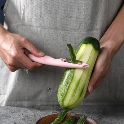 Picture of Serrated Swivel Potato Carrot Peeler Vegetables Peeler cucumber Apples Ultra Sharp PREMIUM Twin Blade Multicolor