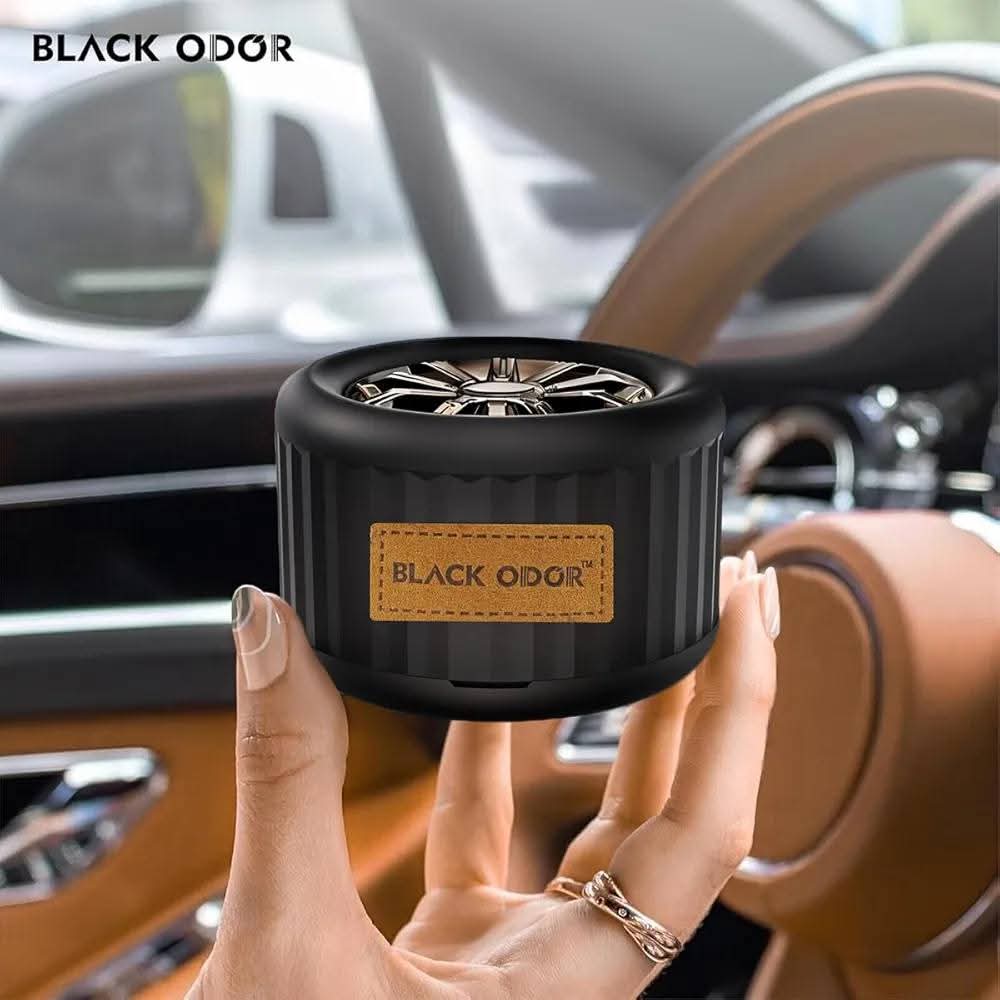 Picture of Lucky Wheel Black ODOR Car Air Freshener - Essential Oil Perfume for Vehicles - Pleasant Scents - Long-Lasting Dashboard Fragrance - Air Vent & Interior Aroma Diffuser (NEW CAR)