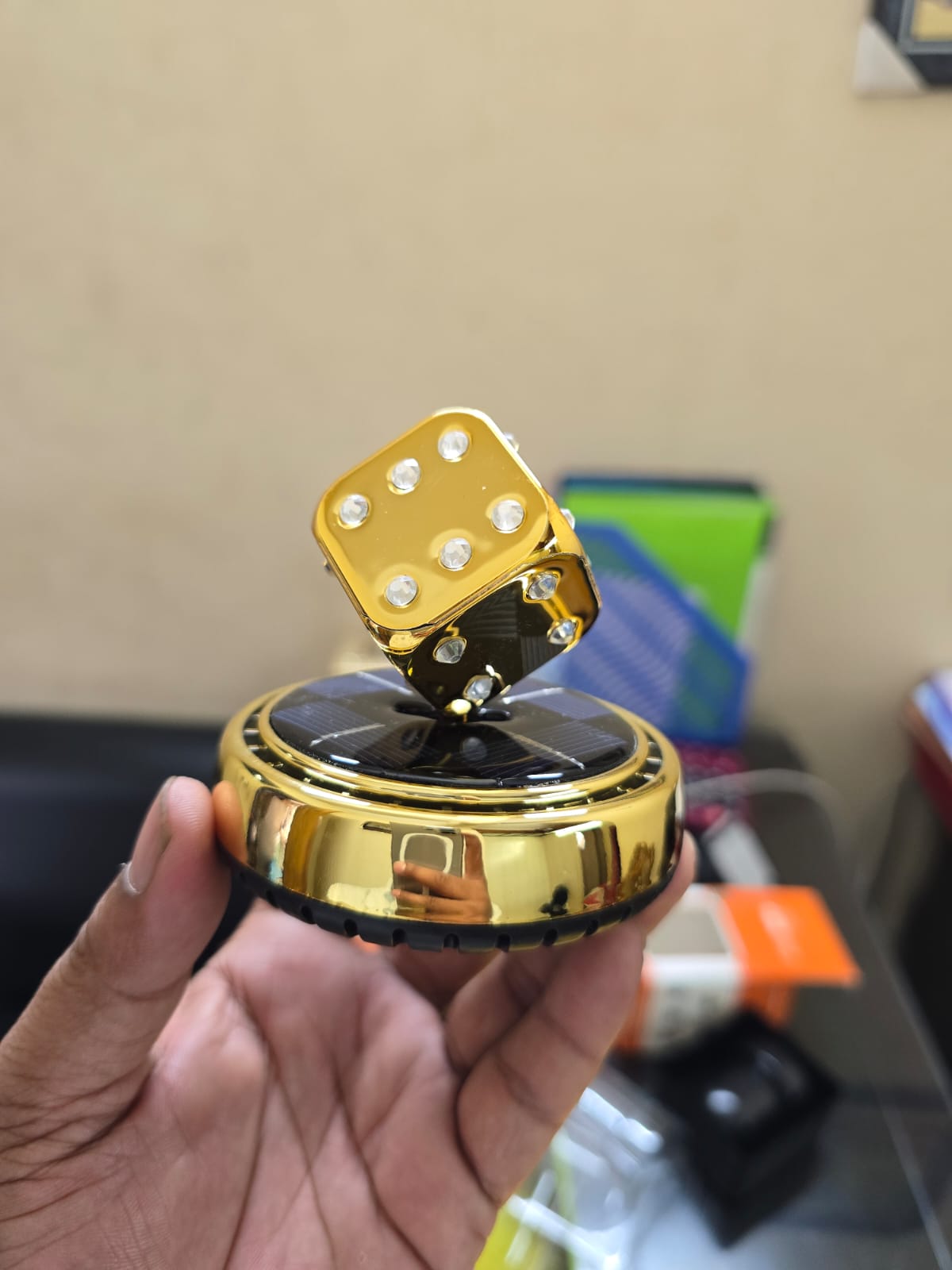 Picture of Solar Rotating Dice Car Perfume – Stylish & Fresh Ride