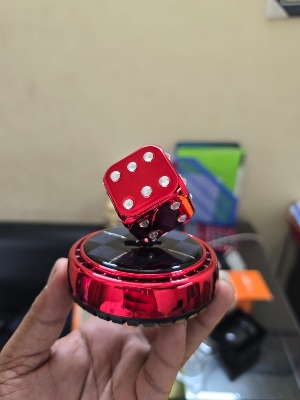 Picture of Solar Rotating Dice Car Perfume – Stylish & Fresh Ride
