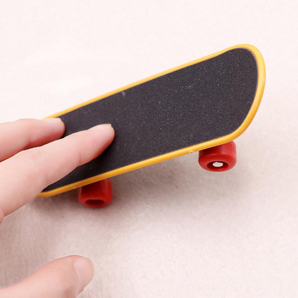 Picture of Creative Printing  plastic Finger Skate board Toy 1pc