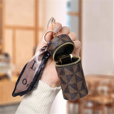 Picture of Mini Keychain Bag Can Store Earphones Lipsticks Hanging Hooks Made Of PVC Material A Gift For Girls