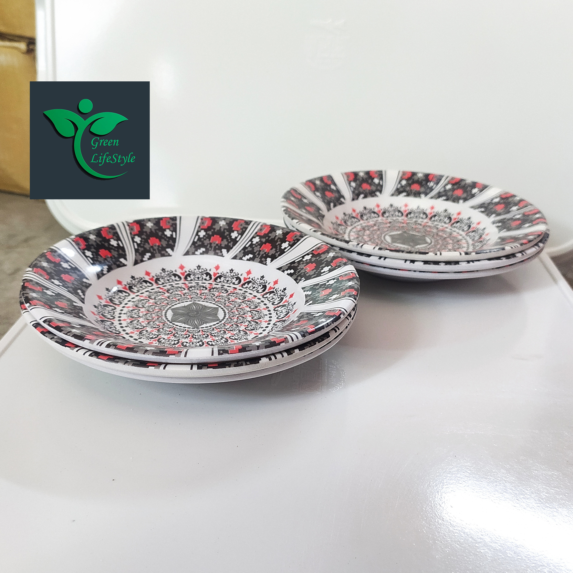 Picture of 6 inch 4 piece set Multi design Print Melamine Mini plate Set. - Multicolor