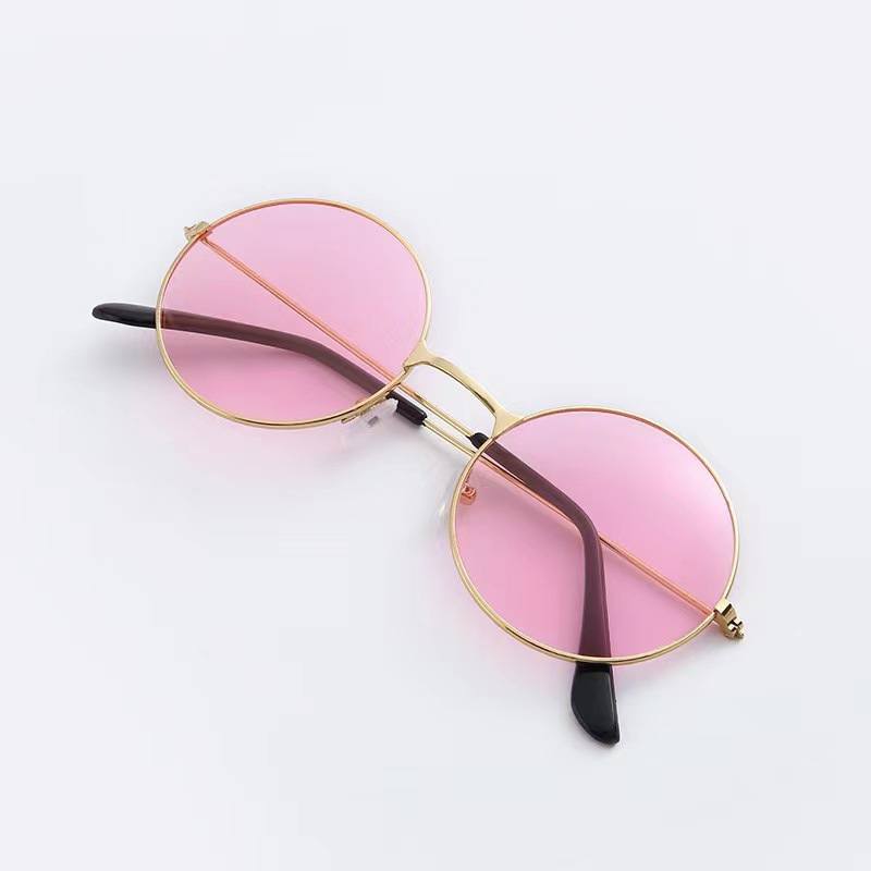 Picture of Trendy 70s Style Pink Sunglasses  Lightweight & Comfortable Eyewear for a Groovy Vibe Light pink 