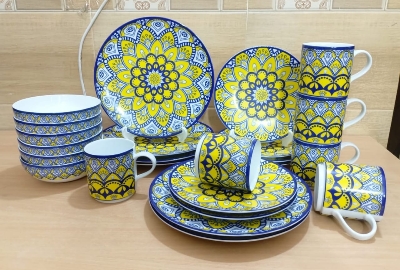 Picture of 24 pieces yellow nakshi dinner set 24 pc dinner set