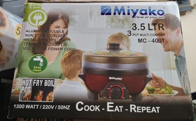 Picture of Miyako 3.5 Liter Multi Cooker MC-400T with Heat Controller including 3 pots 3 lids 1300W Big Power Red Multi Cooker Functional Electric Multi Rice Cooker Multicolor