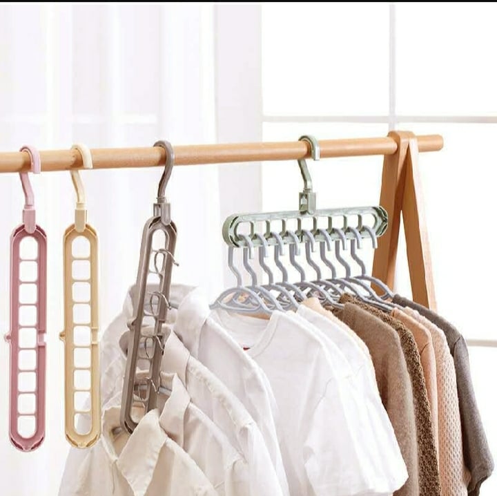 Picture of Rotating Magic Hanger / Multi-Function Folding Magic Cloth Hanger/ 9 Holes Hanger - Multicolor