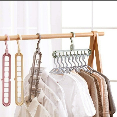 Picture of Rotating Magic Hanger / Multi-Function Folding Magic Cloth Hanger/ 9 Holes Hanger - Multicolor