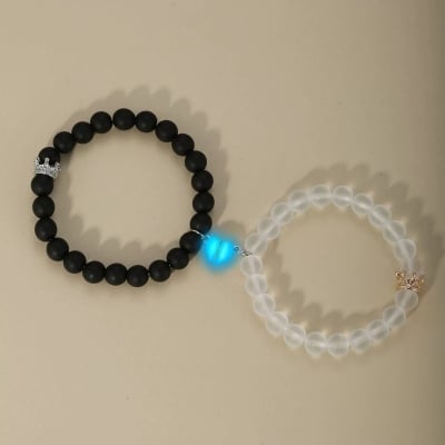 Picture of Shop Pro Magnetic Heart Bracelets for Couples (2 Piece) | Small Rubber Band Magnet Stone Bell Bracelet with Knotted Head Rope