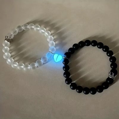 Picture of Shop Pro Magnetic Heart Bracelets for Couples (2 Piece) | Small Rubber Band Magnet Stone Bell Bracelet with Knotted Head Rope