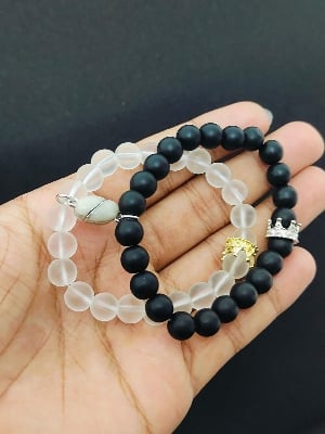 Picture of Shop Pro Magnetic Heart Bracelets for Couples (2 Piece) | Small Rubber Band Magnet Stone Bell Bracelet with Knotted Head Rope