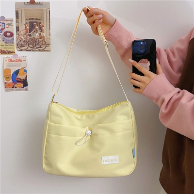 Picture of Korean style trendy nylon tote bag with big front string pocket aesthetic large casual sling bag women bag (Light yellow)