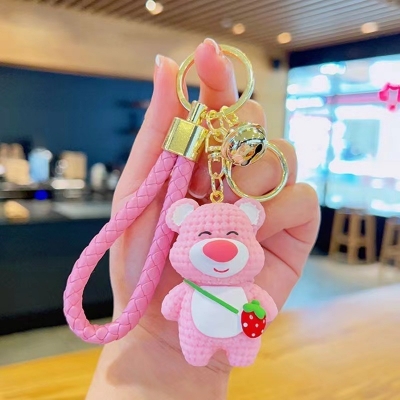 Picture of Cute 3D Strawberry Bear Keychain – Kawaii Knitted-Texture Cartoon Bear Bag Charm with Braided Leather Strap & Bell for Girls/Kids (Pink)