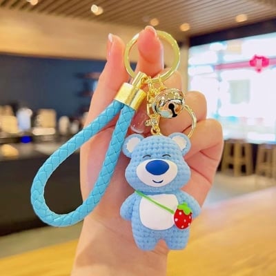 Picture of Cute 3D Strawberry Bear Keychain – Kawaii Knitted-Texture Cartoon Bear Bag Charm with Braided Leather Strap & Bell for Girls/Kids (Blue)