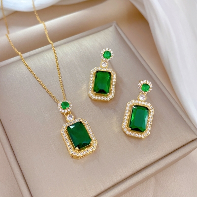 Picture of Elegant Titanium chain gold plated crystal pendant necklace & Matching Earrings Set (Green oval)