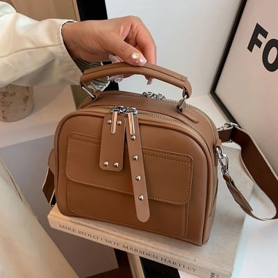 Picture of Material:PU Leather  Pattern:Other  closure type:zipper  shape:Other  style:Fashion  gender:Women  place of origin:China Material  Capacity:other  Waterproof:other  Strap Type:other 