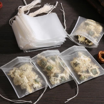 Picture of 100 Pcs Disposable Tea Bags Tea Infuser Filter Bags with String Cure Seal, Food Grade Non-Woven Fabric Spice Filters Tea Bags - White