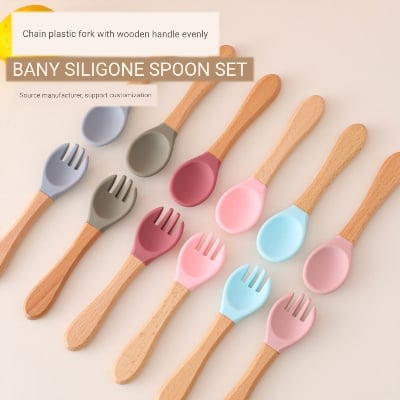 Picture of Baby Wooden Handle Silicone Fork Utensinls Set Kids Eating Training Auxailiary Good Tood Fork Spoon Household Food Supplement Wooden Handle Silicone Fork Spoon Set Shatter-Resistant Children Feeding Spoon 
