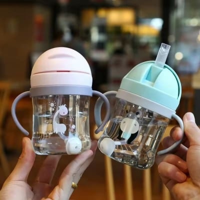 Picture of 250ml Baby Straw Training Cup with Gravity Ball | Anti-Spill Leak-Proof Learning Water Bottle with Handle | BPA-Free Portable Feeding Cup for Toddlers & Kids