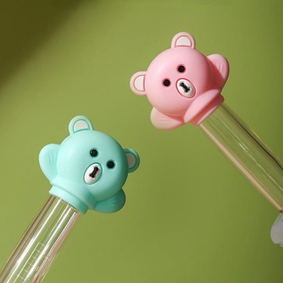 Picture of Infant Health in Style: Cartoon Bear Baby Dropper Feeder - Smart Medicine Dispensing Solution - Multicolor