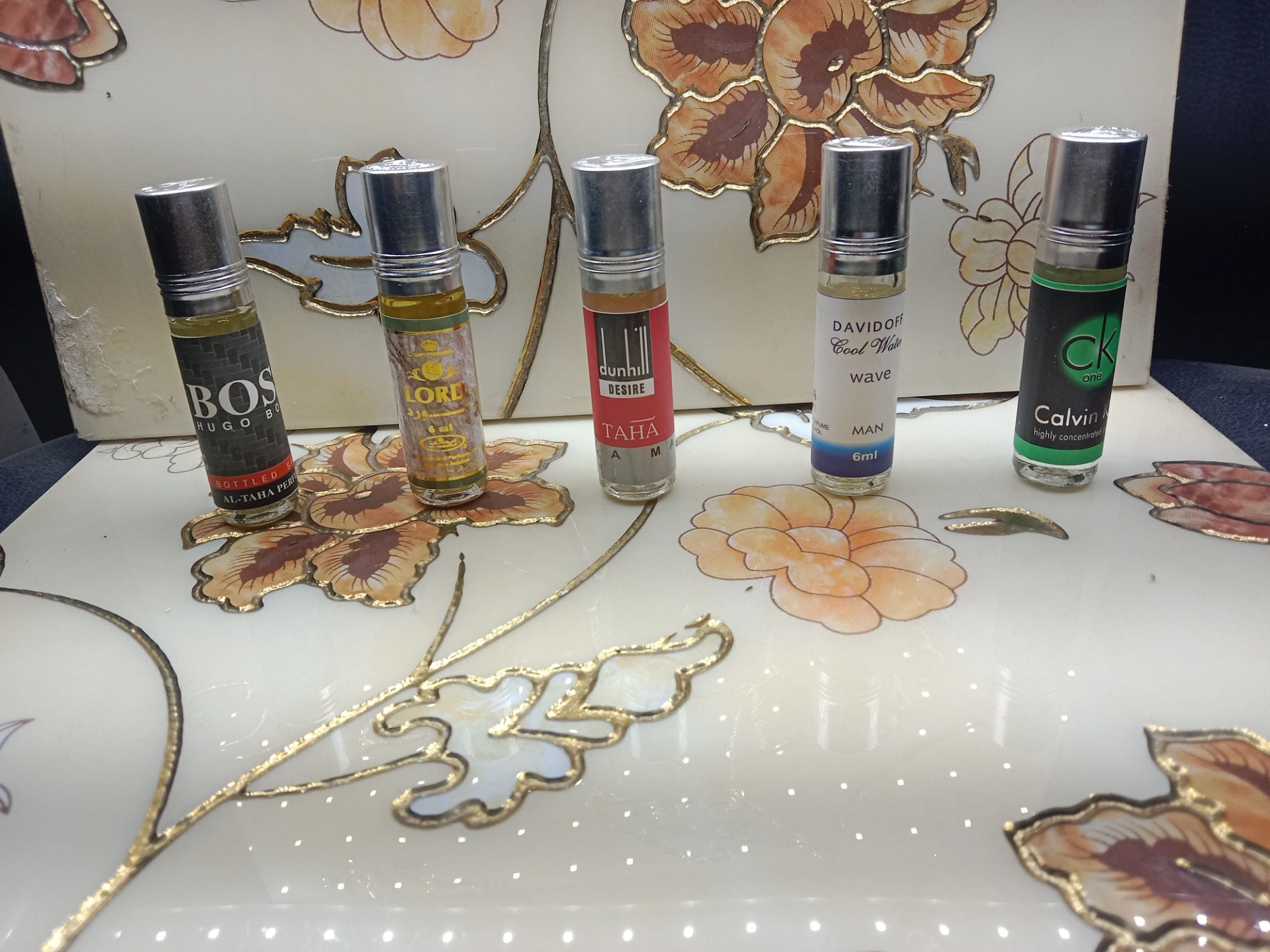 Picture of 5 Mix Flavor - Unveiling a Symphony of Scents - 6 x 5 = 30 ml Roll-On System - Alcohol-Free Perfume Oil | Silicon Mart-Multicolor