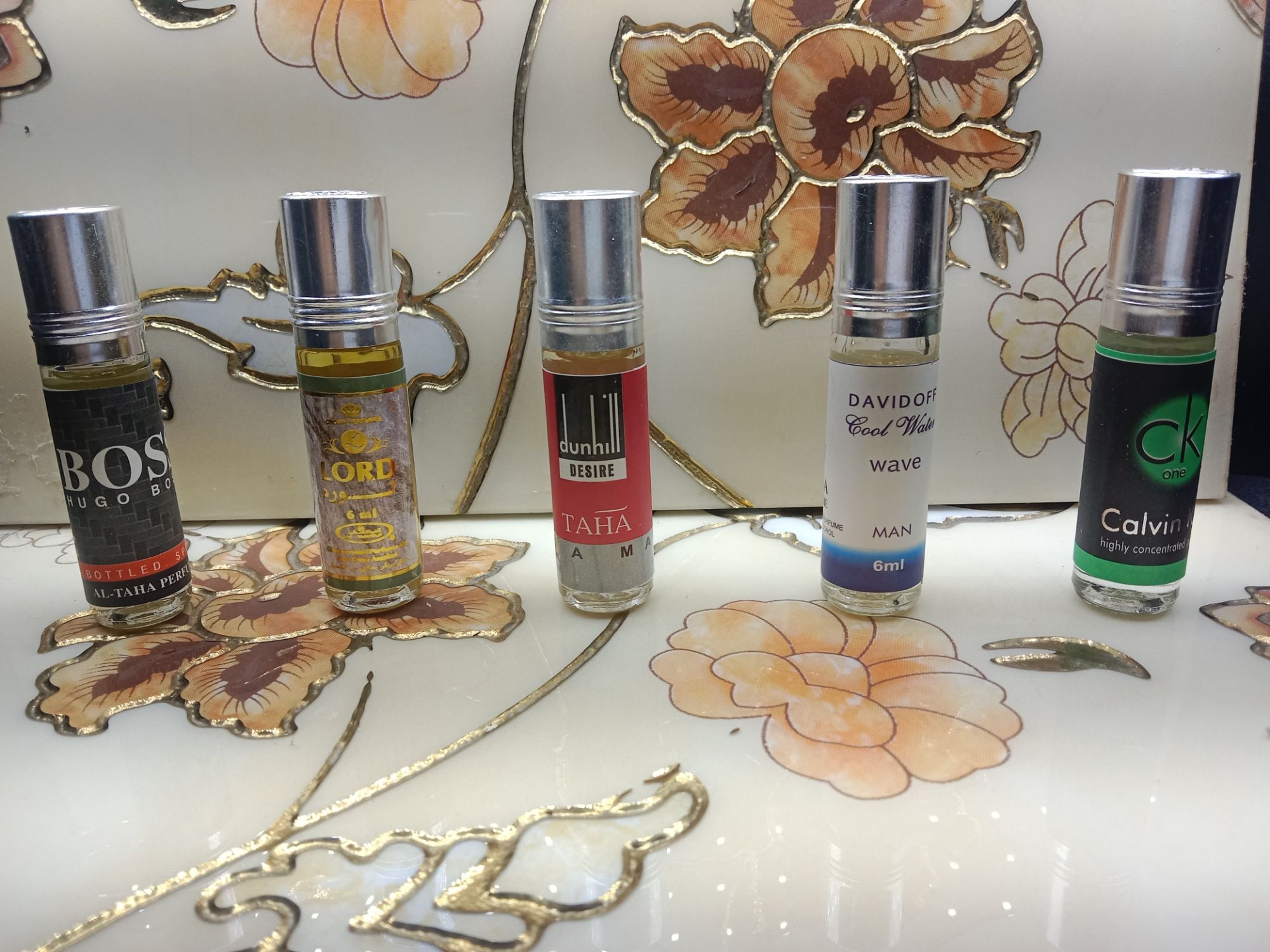 Picture of 5 Mix Flavor - Unveiling a Symphony of Scents - 6 x 5 = 30 ml Roll-On System - Alcohol-Free Perfume Oil | Silicon Mart-Multicolor