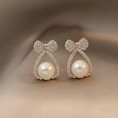 Picture of New Elegant and Exquisite Zircon Bow Pearl Earrings For Woman 2021 Korean Fashion Jewelry Party Girl Temperament Earrings - Off White - Adjustable