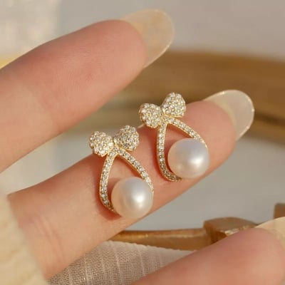 Picture of Cute Simple  Petite Bow Pearl high Sense Earrings  Female Student Fresh Asymmetric Earrings - Off White - Adjustable