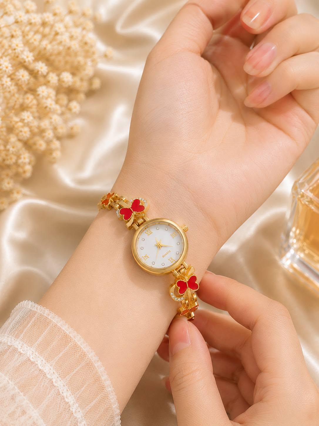 Picture of Elegant Gold White Dial Women Watch | Clover Charm Bracelet Design