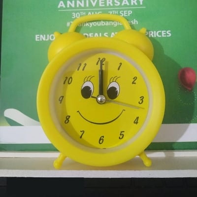 Picture of Smiley Old Style Alarm Clock - Yellow