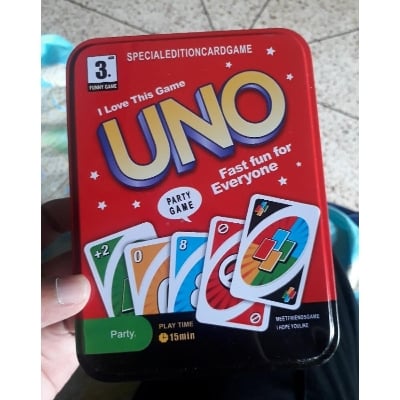Picture of UNO Classic family fun luxury version card game in Steel box