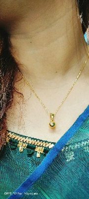Picture of Luxury Golden Ball Pendant Chain | Trendy Necklace for Girls & Women