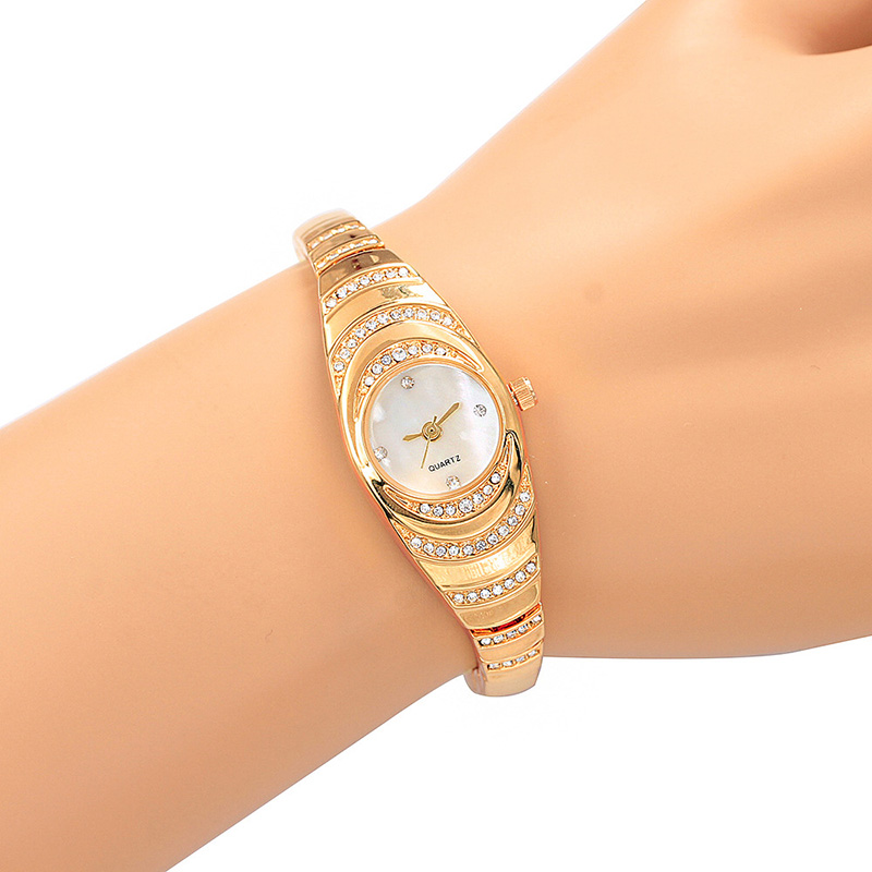 Picture of New Ripple Diamond Watch Women's Bracelet Women's Watch Fritillaria Face Bracelet Women's Watch - Watch For Women -  Watch - Golden Stainless steel Watch For women.
