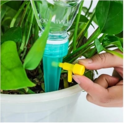 Picture of Automatic Watering Garden Supplies Irrigation Kits System Self-contained Auto Drip Irrigation Watering System Automatic Watering Spike for Plants Flower Indoor Household